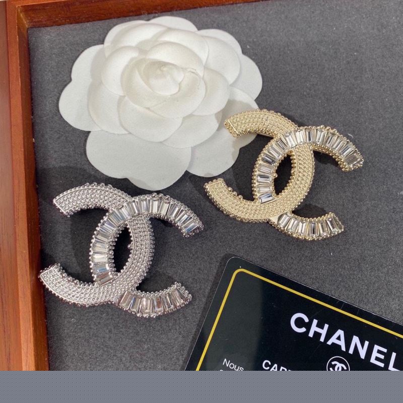 Ch*el brooches